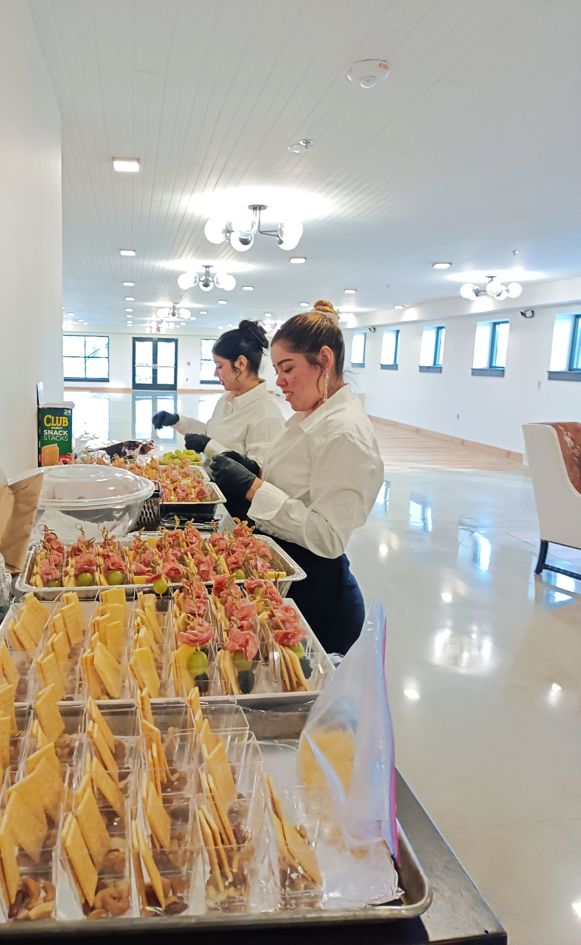 Event catering staff preparing appetizers