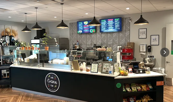 Little Cocina Cafe counter and interior with digital menu boards